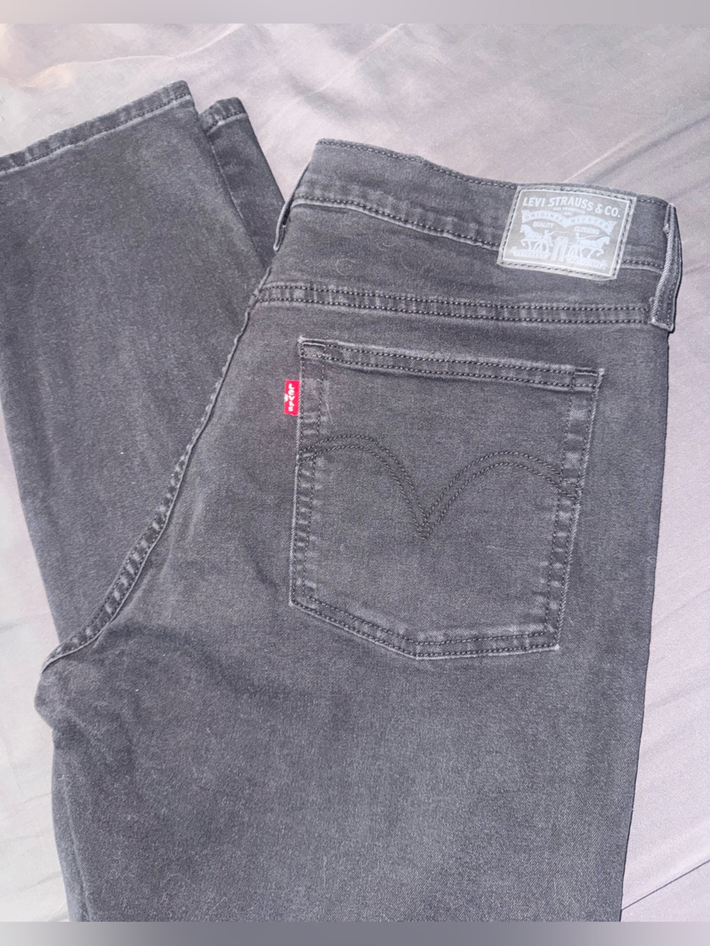 Levi's woman’s stretch Charcoal Black Slim Straight Jeans with Red Tab